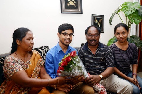 Ratan Lal's picture shows Naman Piush Lakra  with his parents in Ranchi