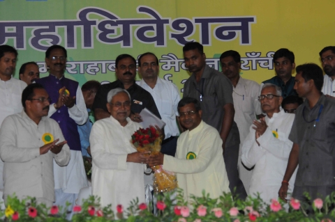 *Ratan Lal's Picture shows Bihar CM Nitish Kumar receiving a bouquet of flowers handed over to him by Jharkhand's Ex CM Babulal Marandi at Morahabadi Maidan in Ranchi on Monday.